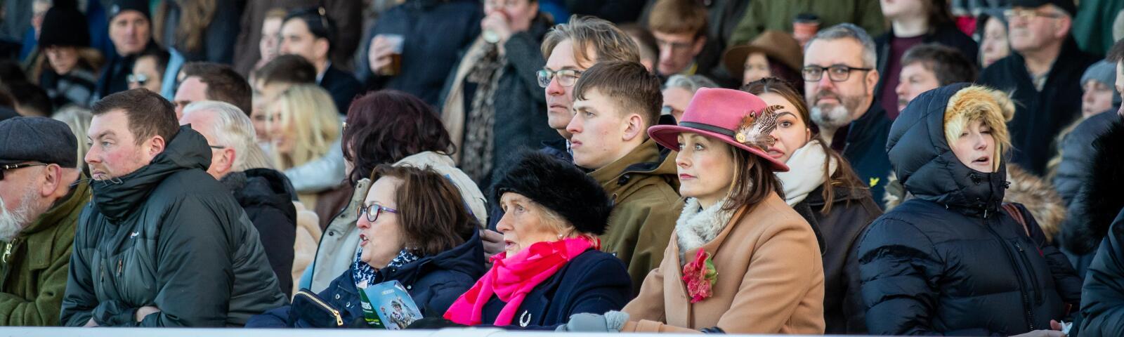The crowd at Sedgefield Races watch from the grandstand